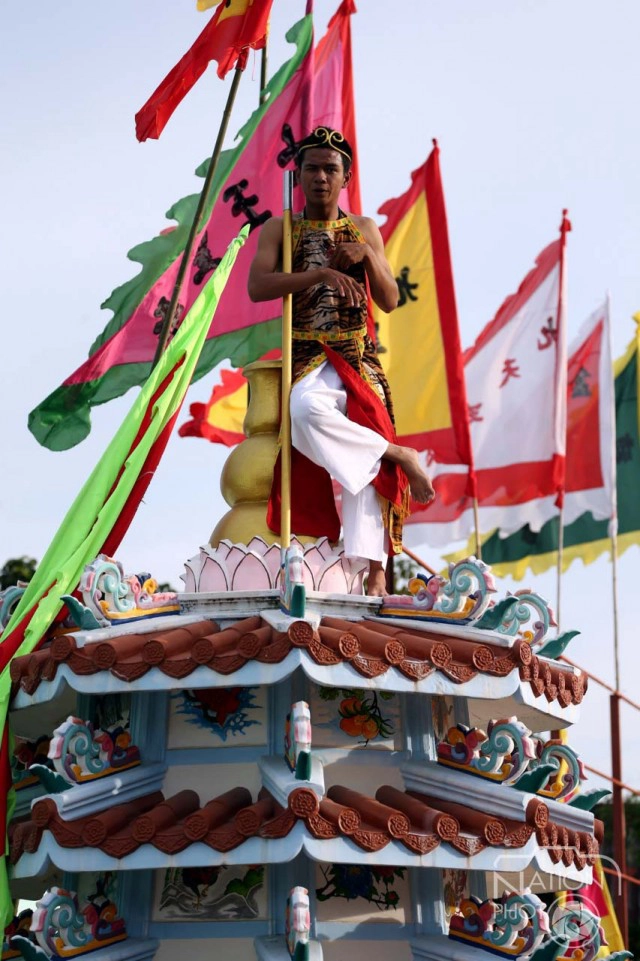 พิธีขึ้นเสาโกเต้ง สัญลักษณ์ของพิธีถือศีลกินเจ