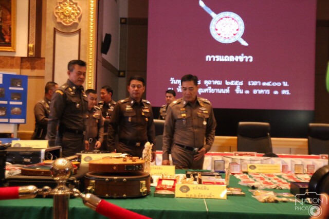 เปิดภาพของกลางที่ ตร.นำมาแถลงในคดีม.112