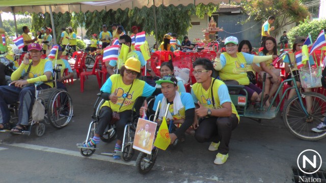 เด็กออทิสติก-ประชาชนกว่าหมื่นคน ใน จ.บุรีรัมย์ พร้อมใจสวมเสื้อเหลืองปั่นถวายพ่อหลวง