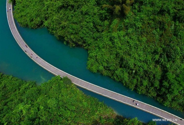 จีนเปิดสะพานไม้ข้ามแม่น้ำวันนี้