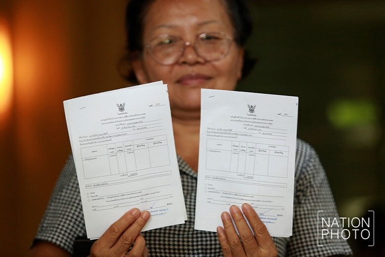 (ภาพชุด)เปิดจองเหรียญที่ระลึกงานพิธีถวายพระเพลิงพระบรมศพ ร.9