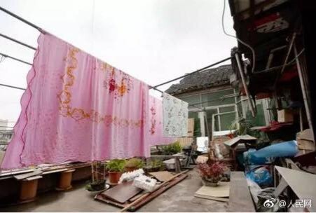 ‘บ้านกลางถนน’ในเซี่ยงไฮ้ยอมยกธงขาวแล้ว