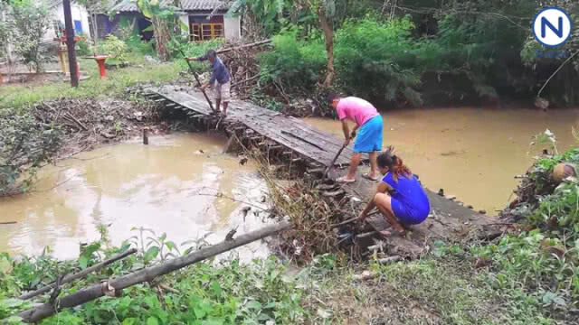 ชาวบ้านเมืองจันฯเริ่มเก็บกวาดหลัง "พายุมังคุด" เบาตัวลง
