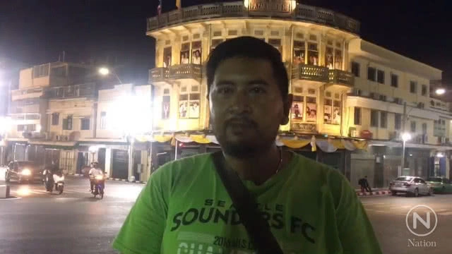 สวยงาม! ตึกโบราณย่านอัษฎางค์ประดับพระบรมฉายาลักษณ์ในหลวง ร.10