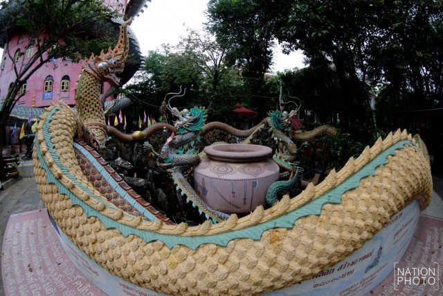 เอกลักษณ์ "วัดสามพราน" ที่มีมังกรตัวใหญ่โอบล้อมตึก