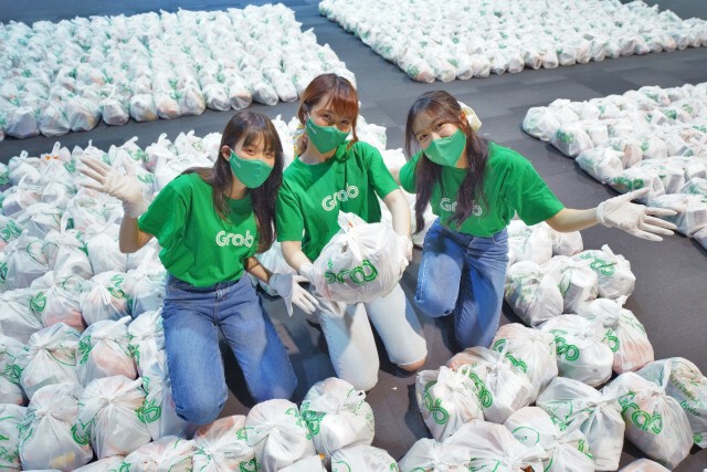แกร็บผนึกพันธมิตรแจกถุงยังชีพพาร์ทเนอร์คนขับ 40,000 ชุด