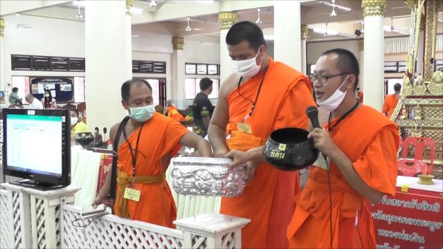 แห่จองวัตถุมงคลสวนกระแสเศรษฐกิจ