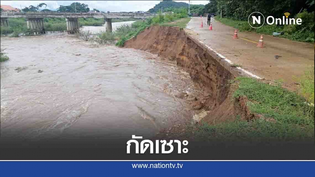 น้ำป่ากัดเซาะตลิ่งถนนเลียบลำน้ำแม่ต๋ำ พังทลาย น้ำป่ากัดเซาะตลิ่งถนนเลียบลำน้ำแม่ต๋ำ พังทลาย