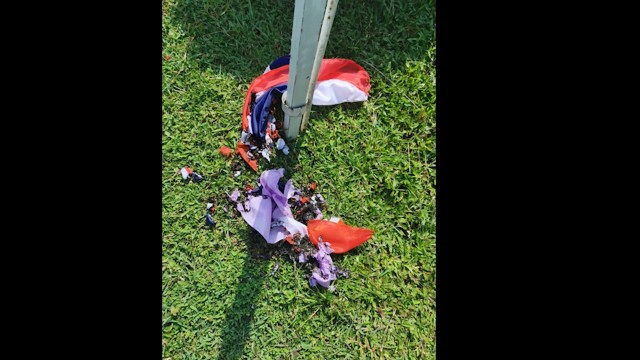 จับสาวเผาธงชาติไทย 13 ผืน