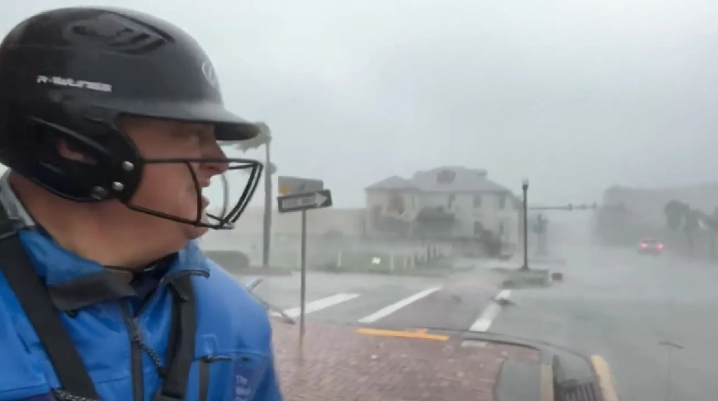 นักข่าวพยากรณ์อากาศสู้ชีวิต 'เฮอร์ริเคนเอียน' (คลิป)