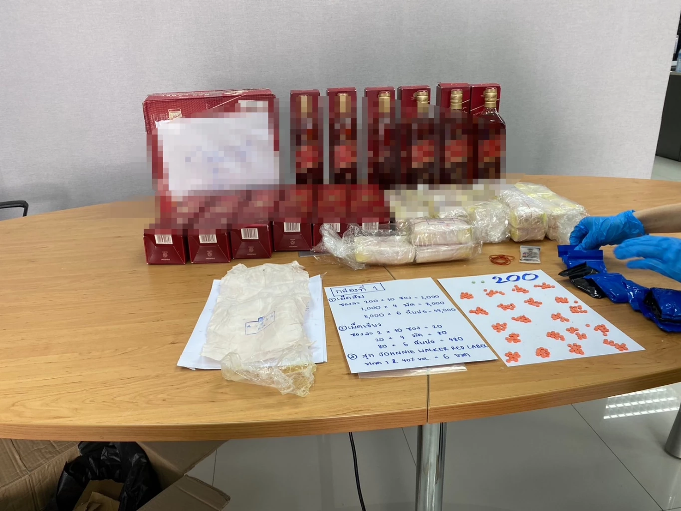 งามหน้า เมีย ขรก.แม่สาย ซุกยาบ้า 3 แสนเม็ด ส่งพร้อมเหล้าเถื่อน ส่งไปปทุมธานี