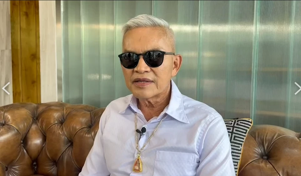 นายอำนวย กลิ่นอยู่ ประธานสมาพันธ์คนพิการผู้ค้าสลากประเทศไทย