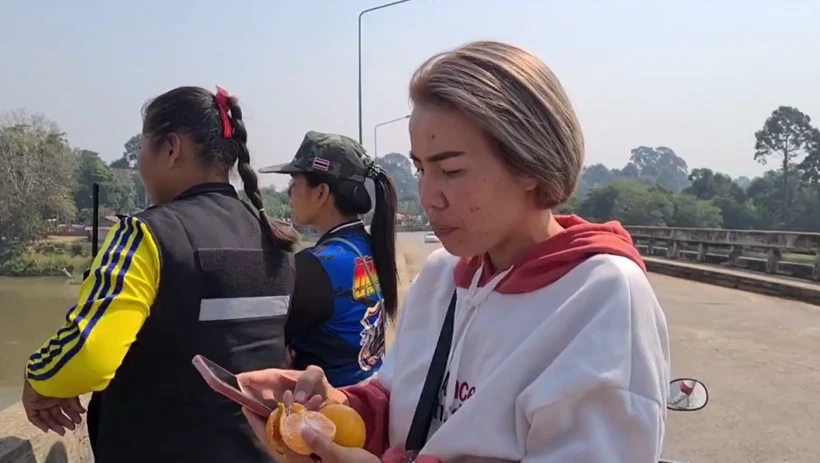 นางสาว ปานอม อาไพพอน ผู้พบเห็นจระเข้