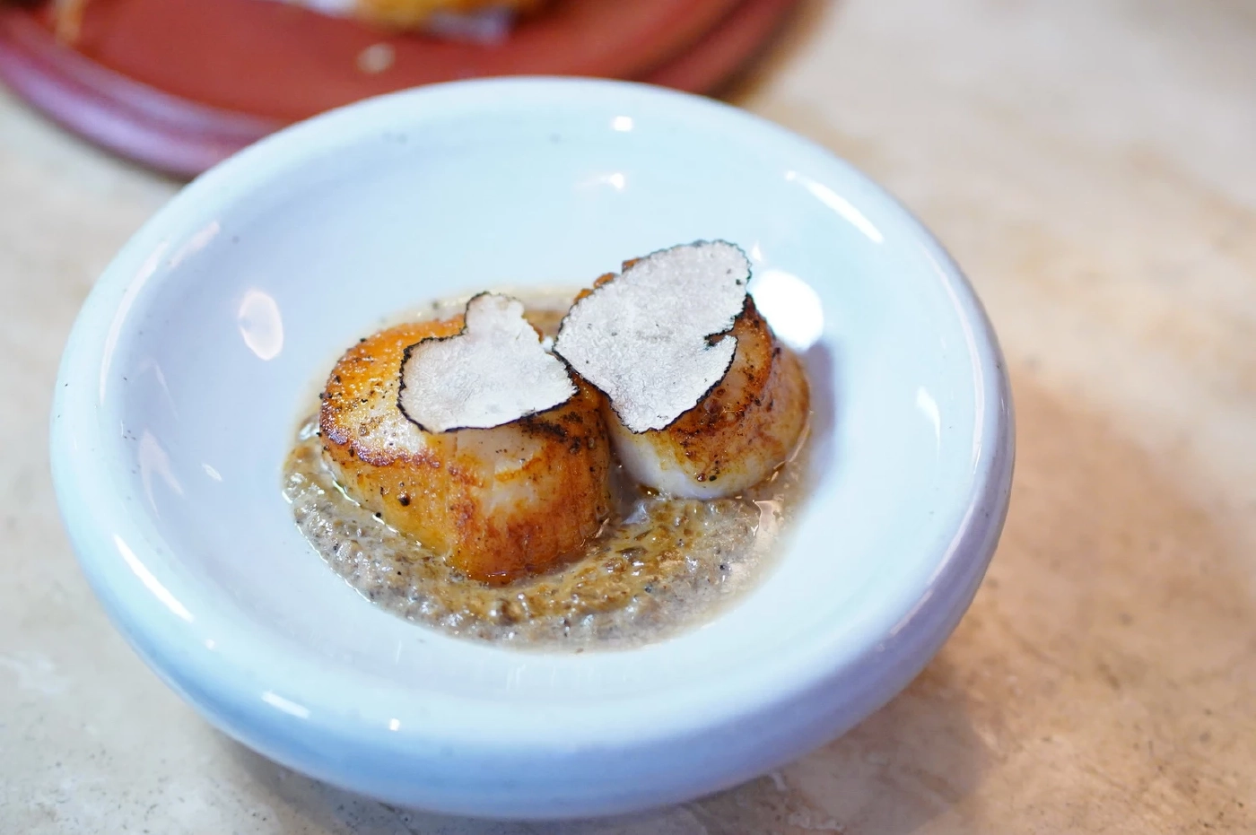 Seared Hokkaido scallop with truffle &amp; porcini sauce