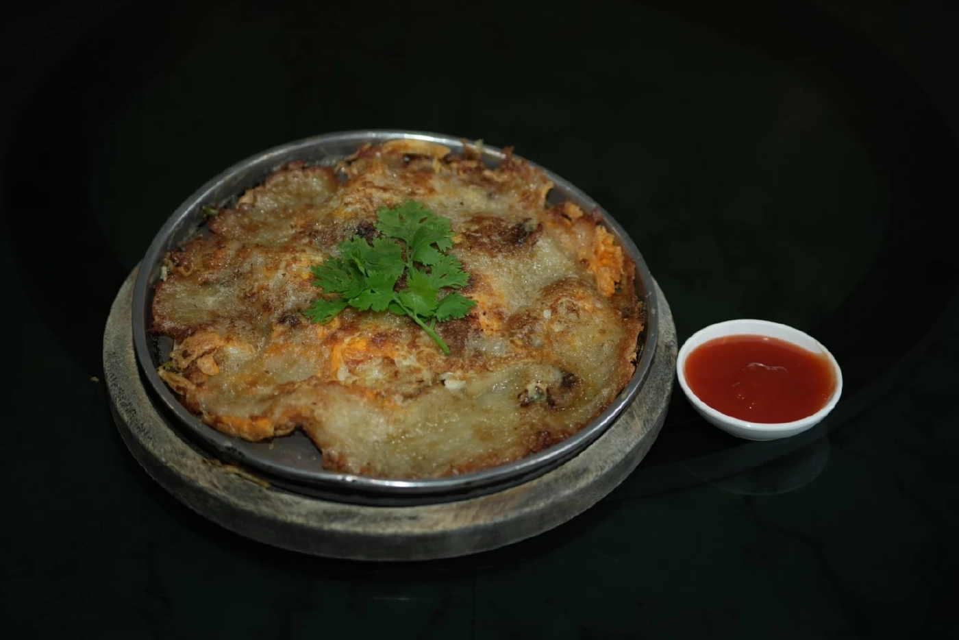 ออส่วนกระทะร้อน