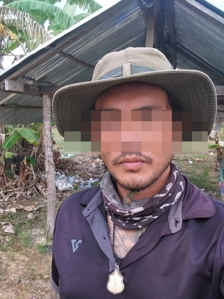 นายพงษ์ ภูธนะกูล หรือบาส ครูสอนยิงปืน