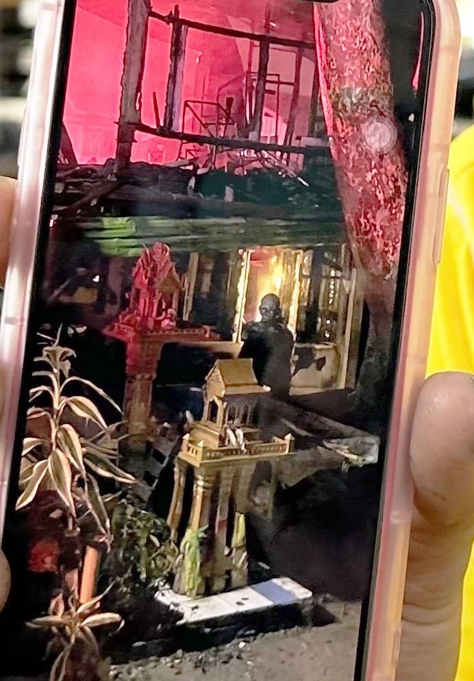 เจ้าของภาพเฉลยแล้ว ภาพปริศนาชวนขนลุก ชายลึกลับโผล่กลางบ้านไฟไหม้