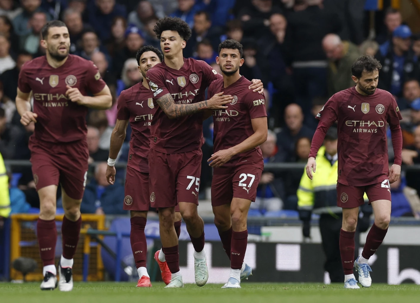 Manchester City's Nico O'Reilly in action, a young player's success in the Premier League
