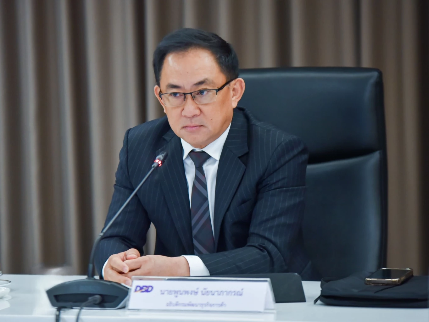 พูนพงษ์ นัยนาภากรณ์ อธิบดีกรมพัฒนาธุรกิจการค้า