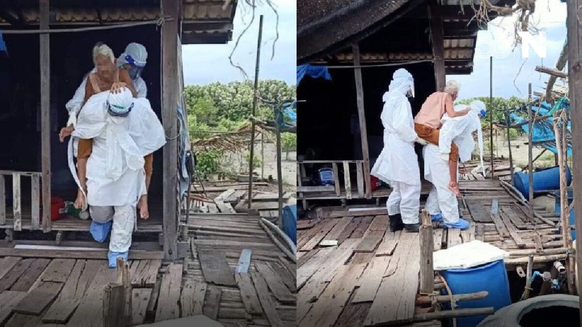 ชื่นชม! จนท.สวมชุด PPE เดินเท้าไกล 2 กม.แบกคุณยายติดเชื้อโควิดรักษา ชื่นชม! จนท.สวมชุด PPE เดินเท้าไกล 2 กม.แบกคุณยายติดเชื้อโควิดรักษา