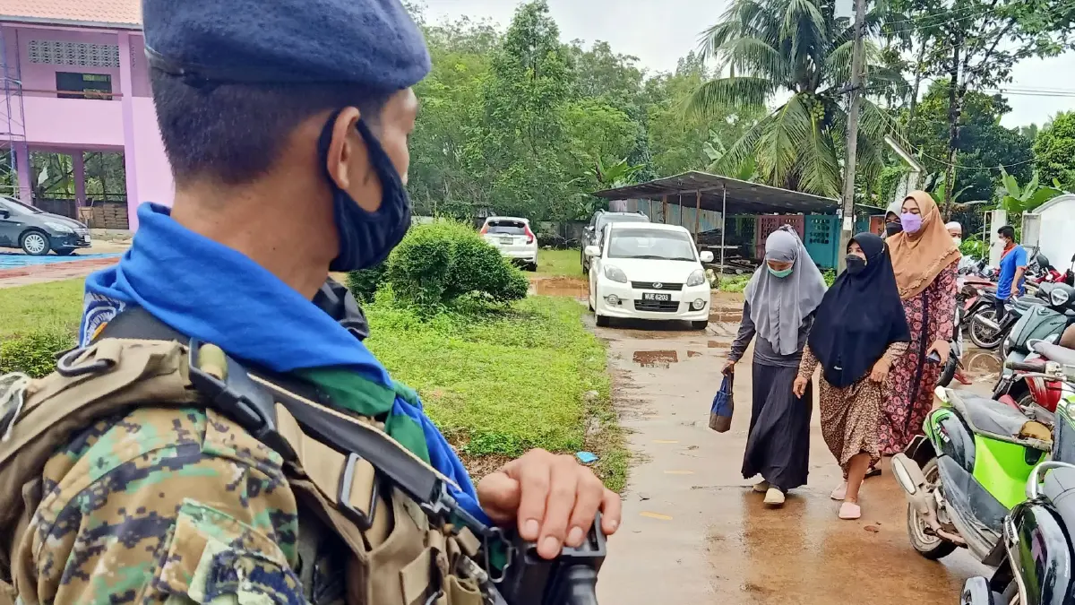เลือกตั้งอบต.นราธิวาส ท่ามกลางสายฝน รปภ.เข้ม เลือกตั้งอบต.นราธิวาส ท่ามกลางสายฝน รปภ.เข้ม