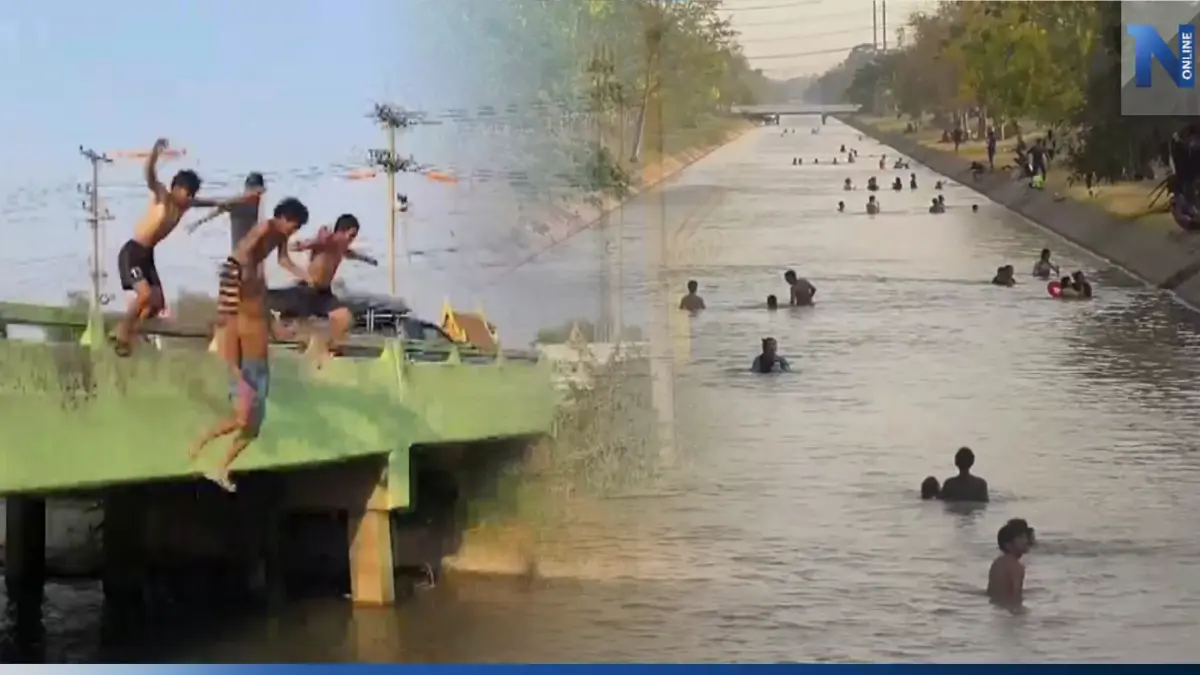 อ่างทองร้อนจัด อุณหภูมิเดือดทะลุ 40 องศาฯ ชาวบ้านแห่เล่นน้ำคลายร้อน