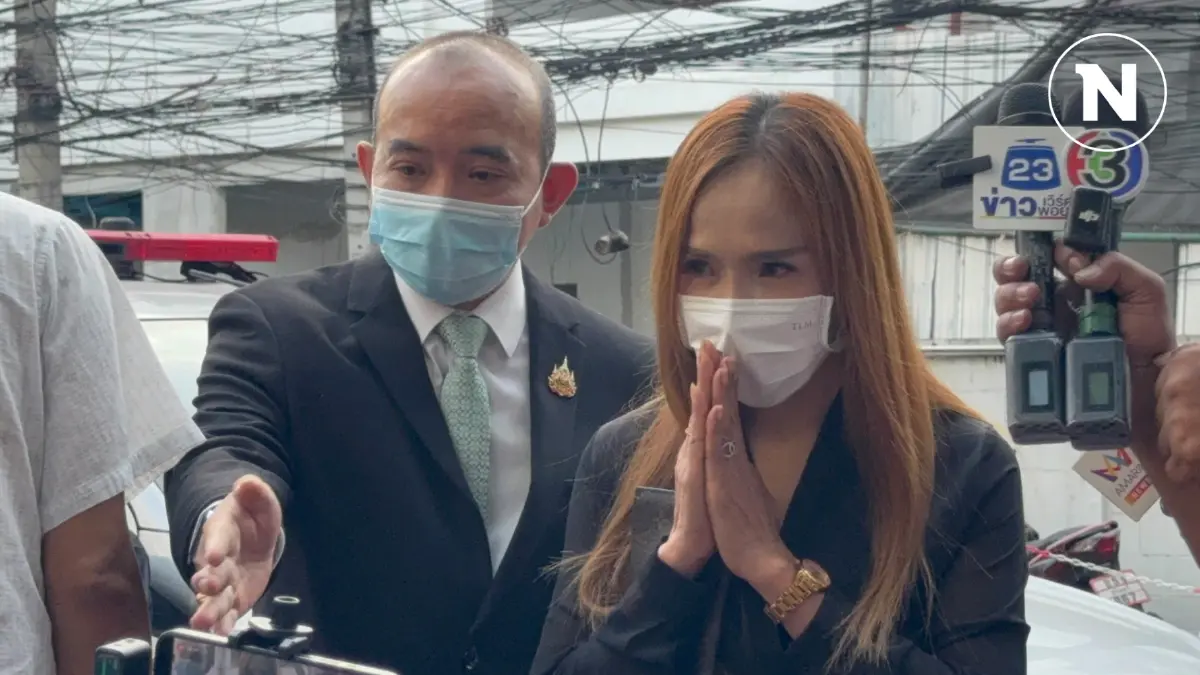 "เจ๊หนิง" - สามี มอบตัวสู้คดี เมียบิ๊กตำรวจ ฟ้องกลับข้อหา "แจ้งความเท็จ"