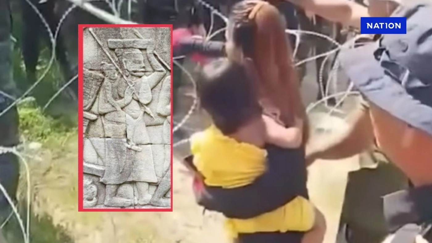 สื่อกัมพูชาอวยยศหญิงกัมพูชาอุ้มลูก ปฏิมากรรมกำแพงวัด